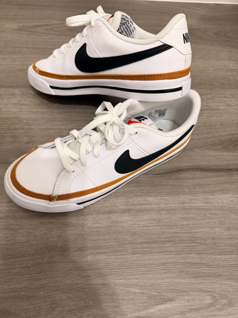 Nike White Low-Top Sneakers with Black Branding